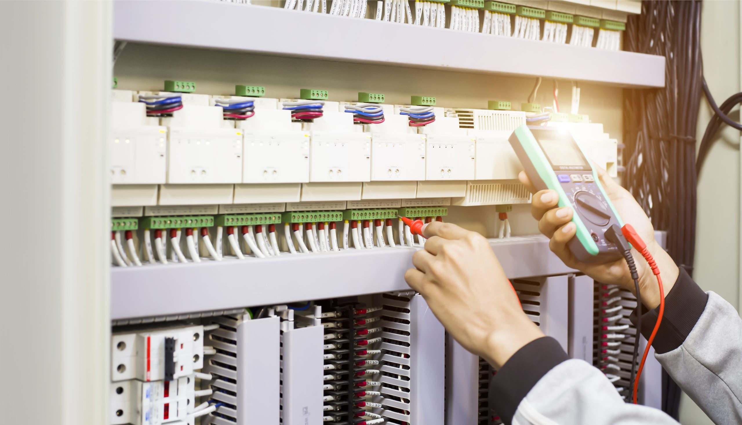electrical-engineer-checking-operation-electrical-control-cabinet-maintenance-concept